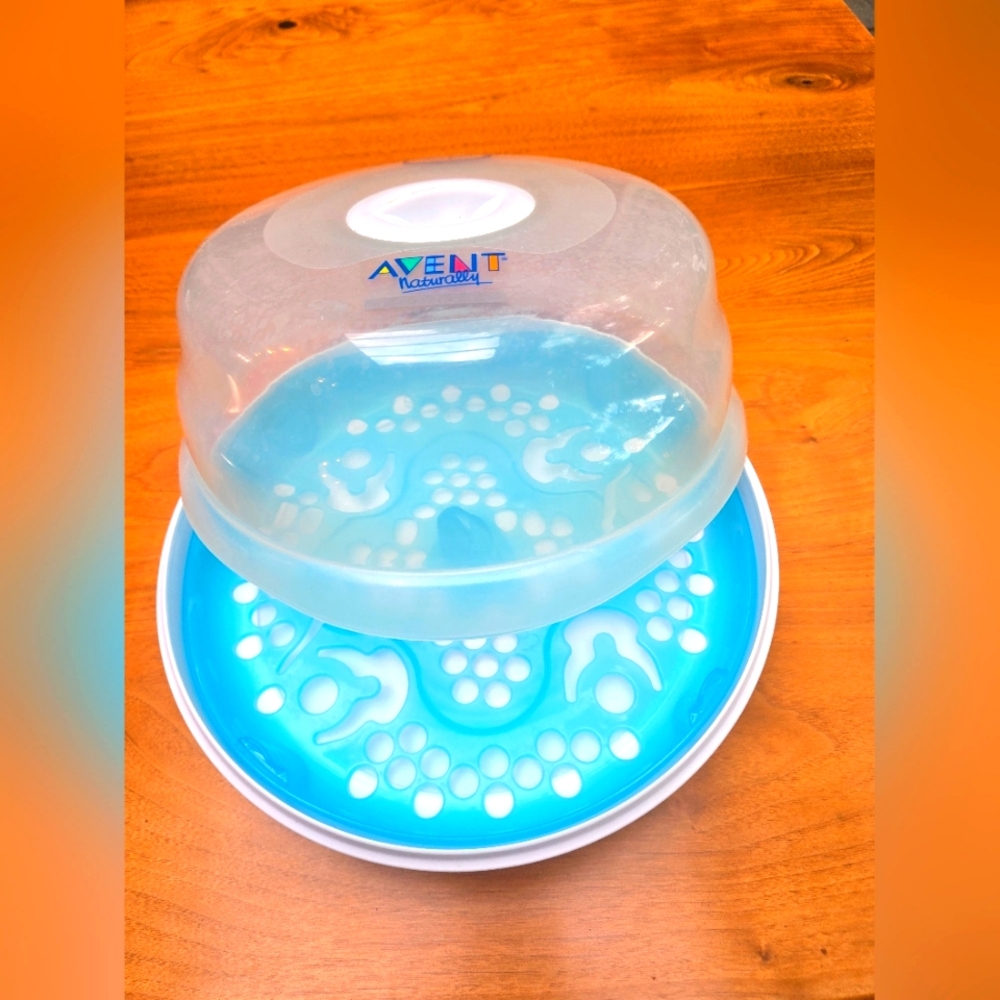 Avent naturally express microwave baby bottle sterilizer.  Type 02/2000